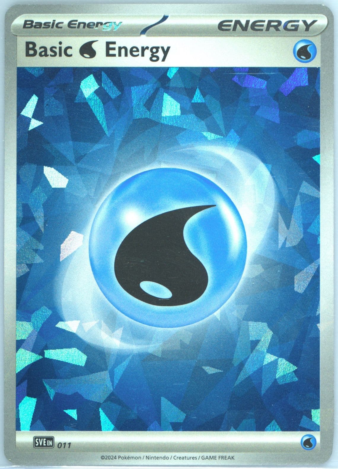 Basic Water Energy Cracked Ice Holo (011) 2024 Pokemon Sve EN-Basic Energies